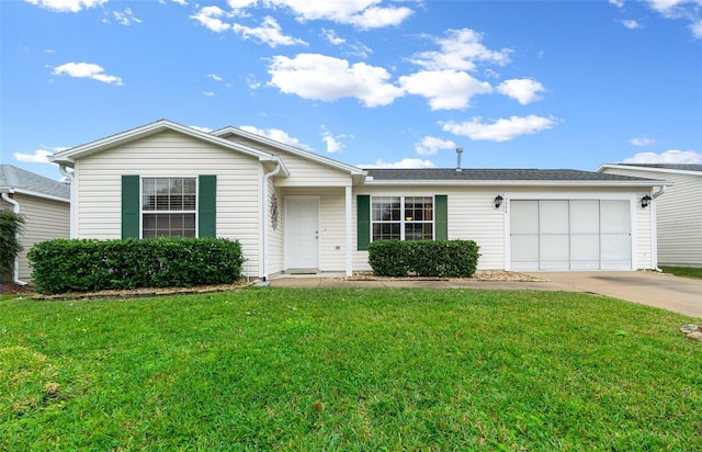 ranch-style home with a garage and a front lawn