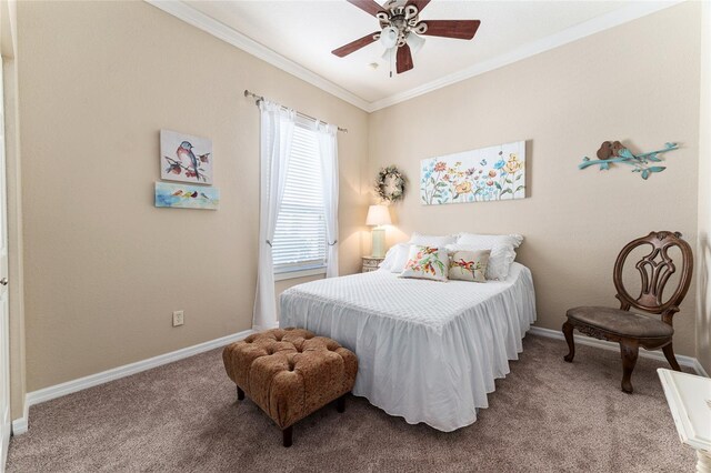 carpeted bedroom featuring ornamental molding and ceiling fan