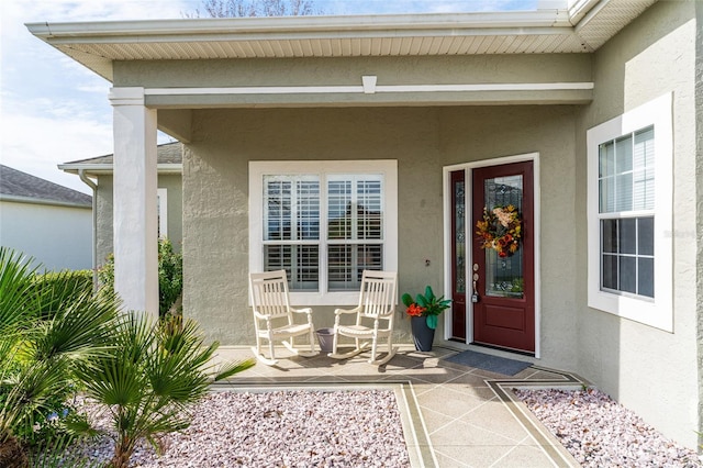 entrance to property with a patio area