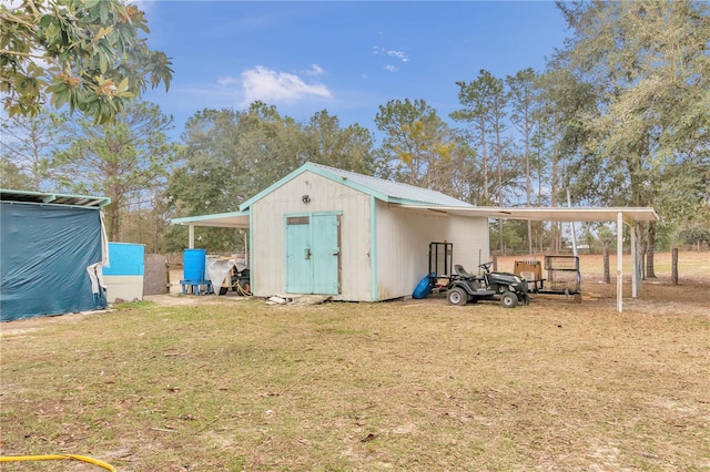 view of shed / structure with a yard