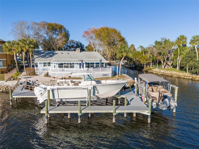 view of dock with a water view