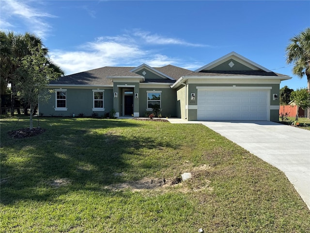 ranch-style house featuring a front lawn and a garage