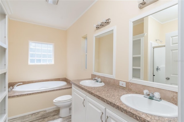 full bathroom with hardwood / wood-style floors, vanity, plus walk in shower, crown molding, and toilet