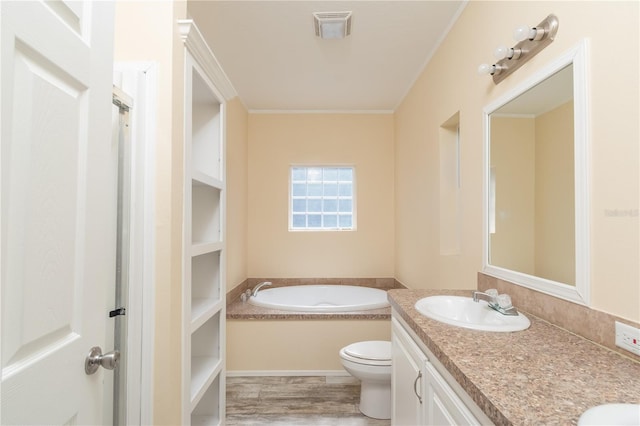 bathroom with a tub, wood-type flooring, toilet, vanity, and ornamental molding