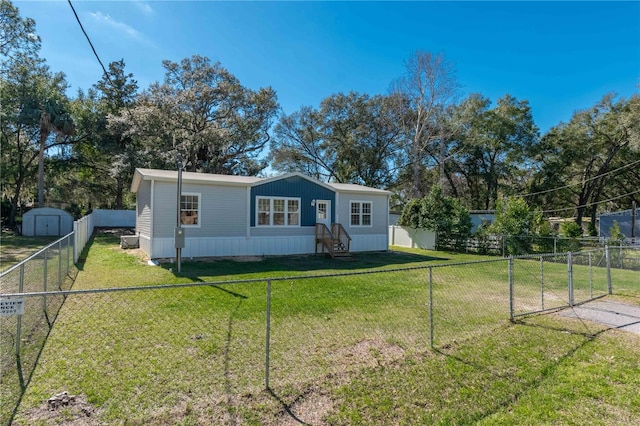 view of front facade featuring a shed and a front lawn