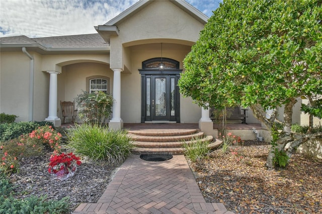 entrance to property featuring french doors