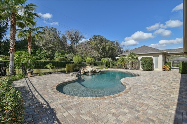 view of swimming pool featuring a patio area