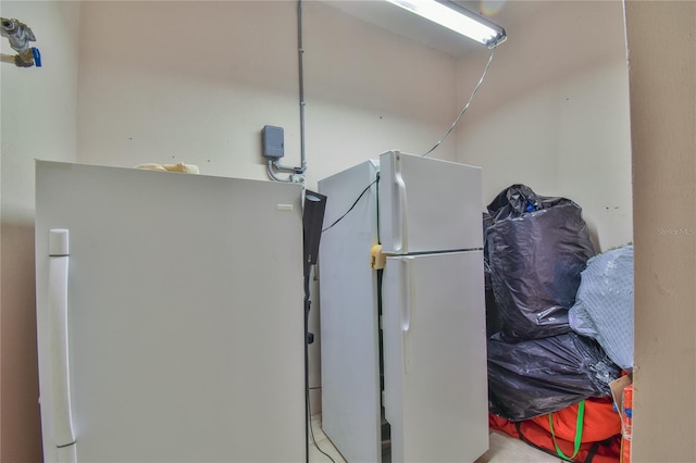 interior space featuring white refrigerator