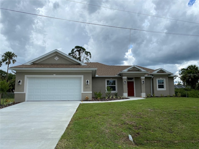 single story home with a front yard and a garage