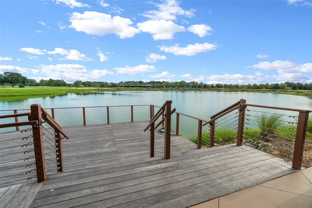 dock area featuring a deck with water view