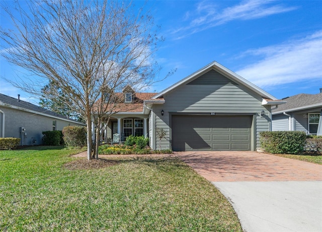 ranch-style home with a front yard and a garage