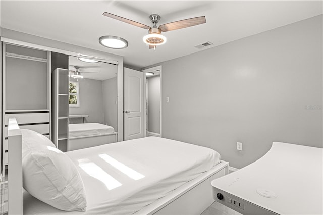 bedroom featuring a closet and ceiling fan