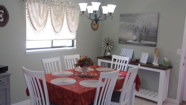 dining area with a chandelier