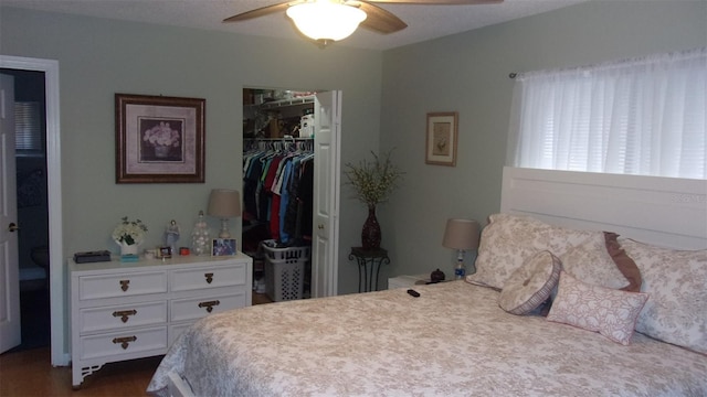 bedroom featuring a closet and ceiling fan