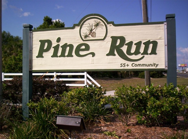 view of community sign