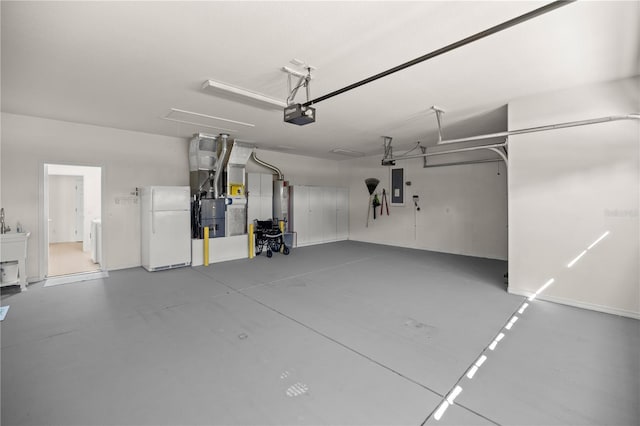 garage with a garage door opener, electric panel, white refrigerator, water heater, and washing machine and clothes dryer