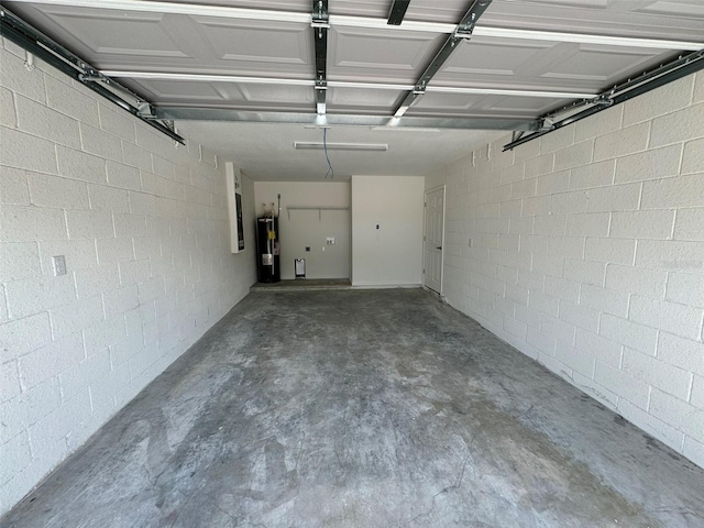 garage featuring water heater