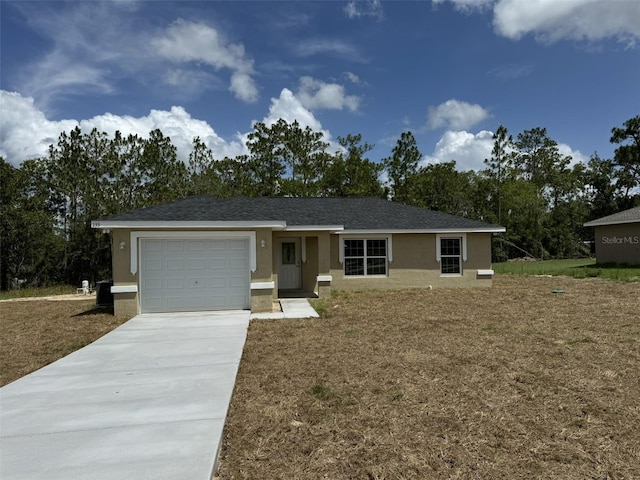 single story home with a garage