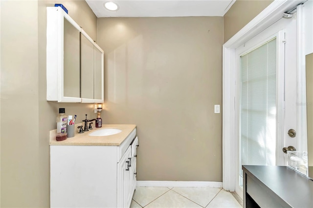 bathroom with tile flooring and large vanity