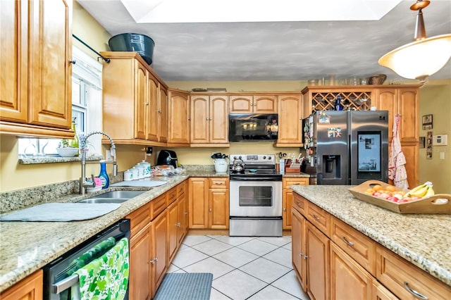 kitchen featuring sink, light tile floors, hanging light fixtures, stainless steel appliances, and light stone countertops