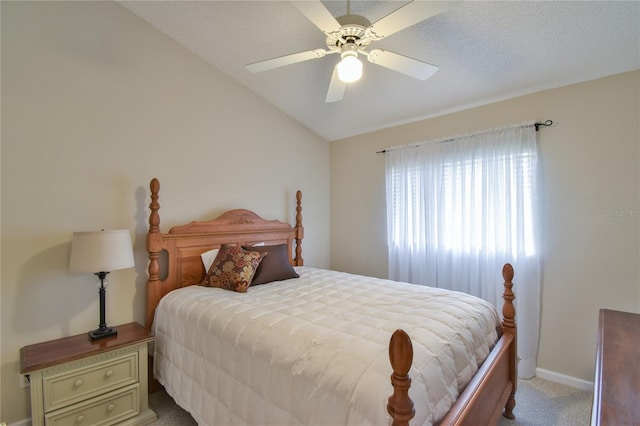 carpeted bedroom with lofted ceiling and ceiling fan