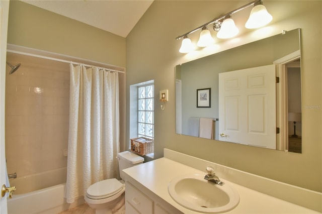 full bathroom featuring toilet, vanity with extensive cabinet space, and shower / bath combo