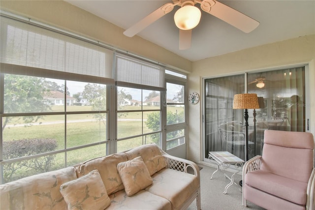 sunroom / solarium with ceiling fan