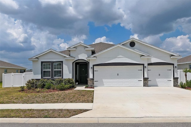 view of front of home with a garage