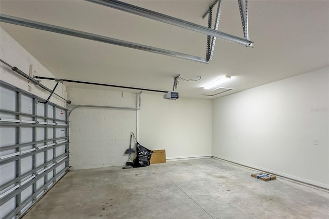 garage featuring a garage door opener