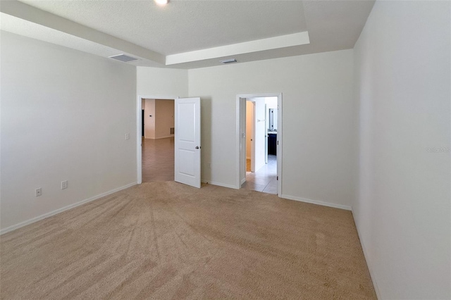 interior space featuring a tray ceiling