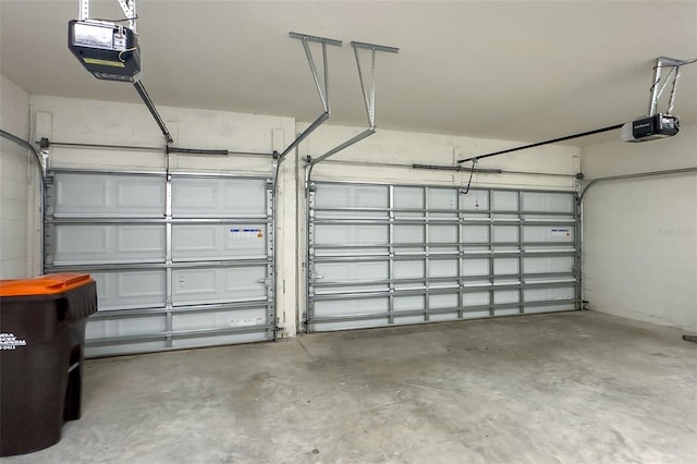 garage featuring a garage door opener