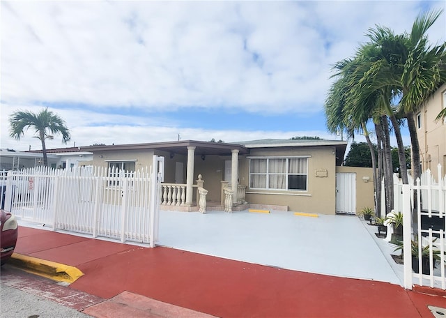 view of front of house with a patio area