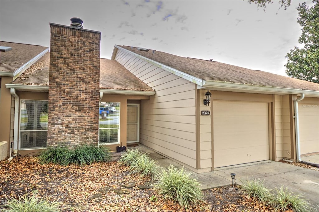 ranch-style home with a garage