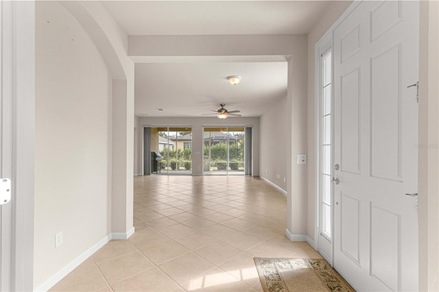 hallway featuring light tile patterned flooring