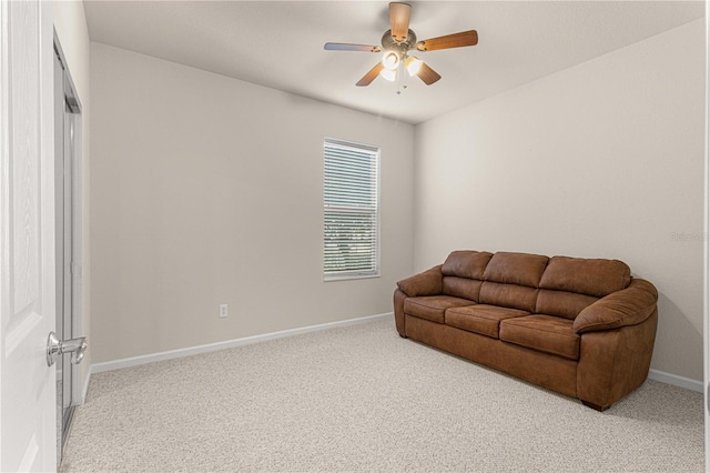 sitting room featuring carpet flooring and ceiling fan