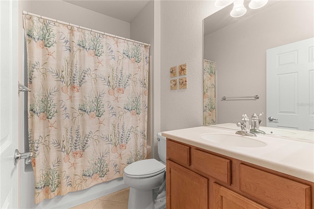 full bathroom featuring tile patterned flooring, toilet, vanity, and shower / tub combo with curtain