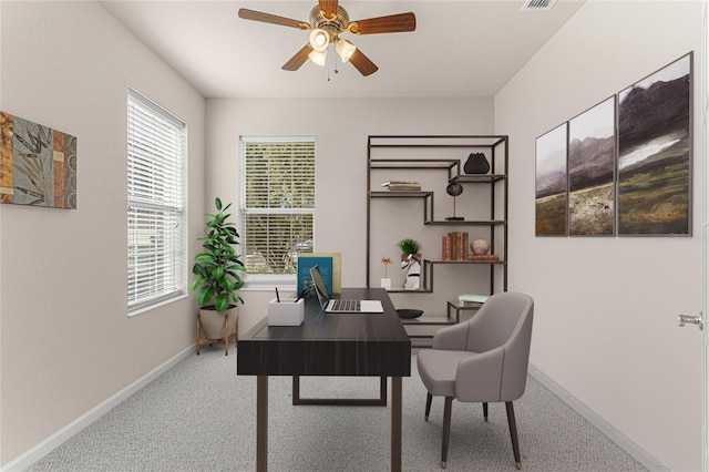 office with carpet and ceiling fan