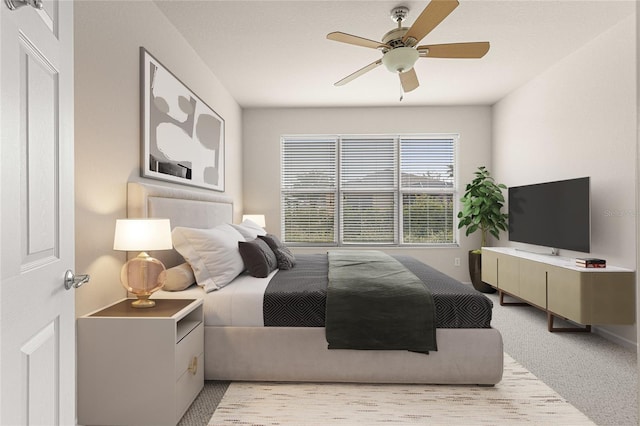 bedroom featuring ceiling fan and light colored carpet