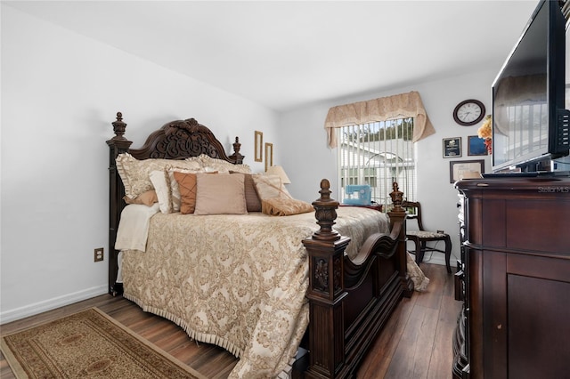 bedroom featuring dark wood-type flooring