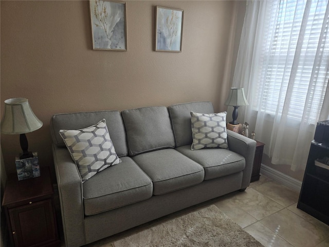 living room with light tile floors