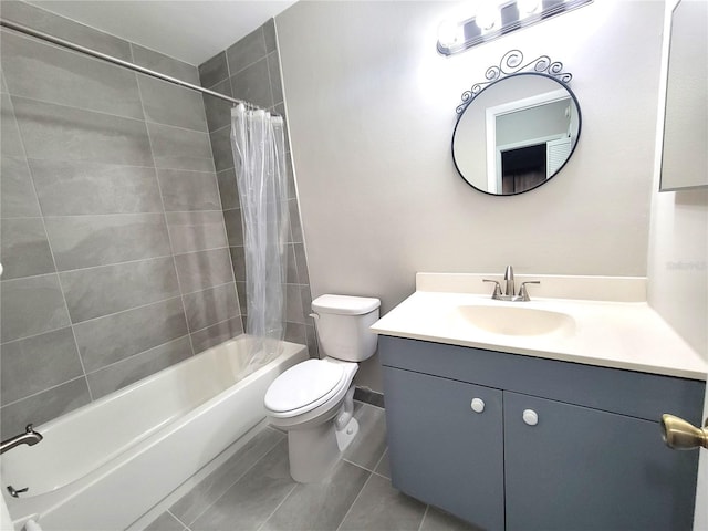 full bathroom with toilet, tile patterned floors, shower / bath combo with shower curtain, and vanity