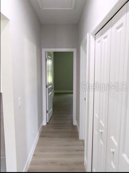 hallway featuring light hardwood / wood-style floors