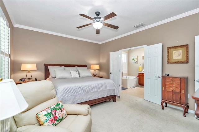 carpeted bedroom featuring connected bathroom, ceiling fan, and crown molding