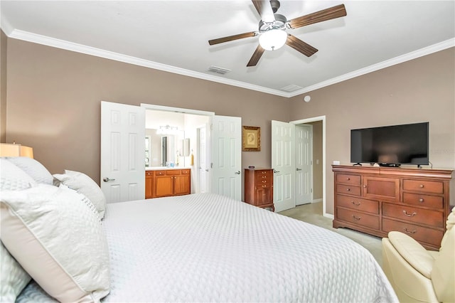 carpeted bedroom with connected bathroom, ornamental molding, and ceiling fan