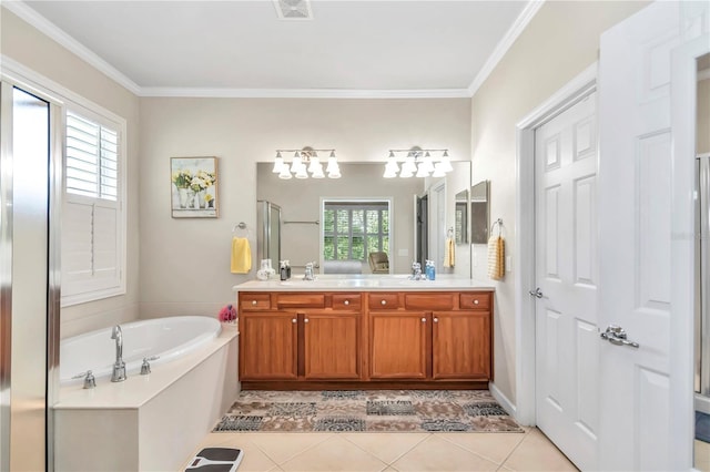 bathroom with crown molding, a bath to relax in, tile floors, and vanity with extensive cabinet space