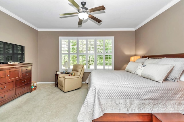 bedroom featuring light carpet, ornamental molding, and ceiling fan