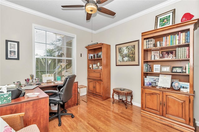 office space featuring crown molding, light hardwood / wood-style floors, and ceiling fan