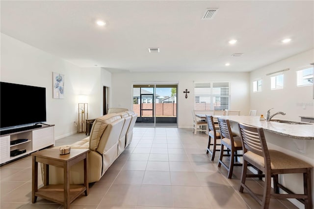 tiled living room with sink