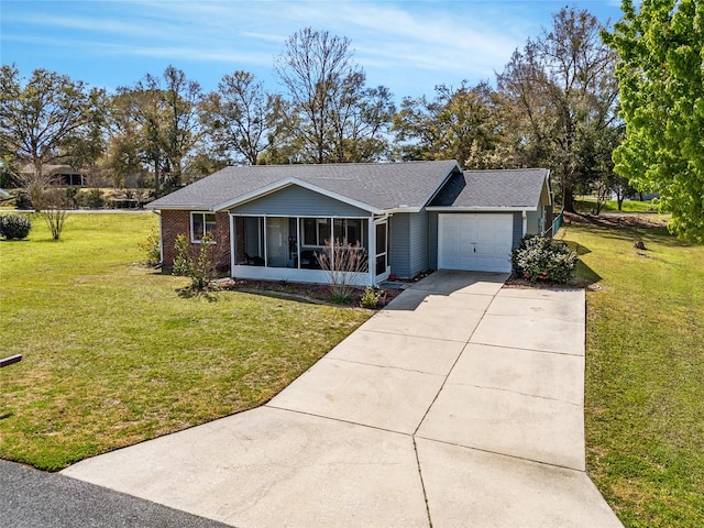 single story home featuring a front yard and a garage