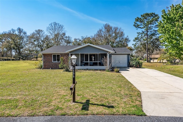 single story home featuring a front yard and a garage